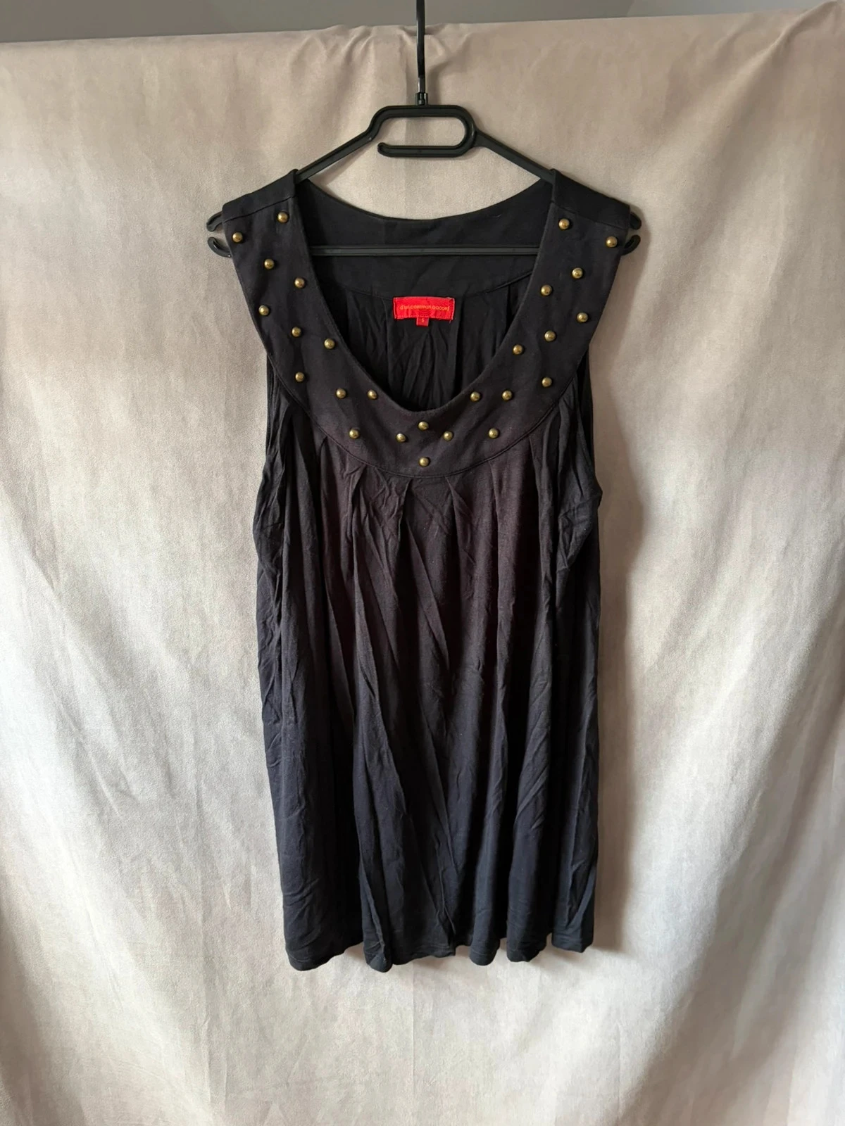 Tunique noire taille 5 d’un commun accord